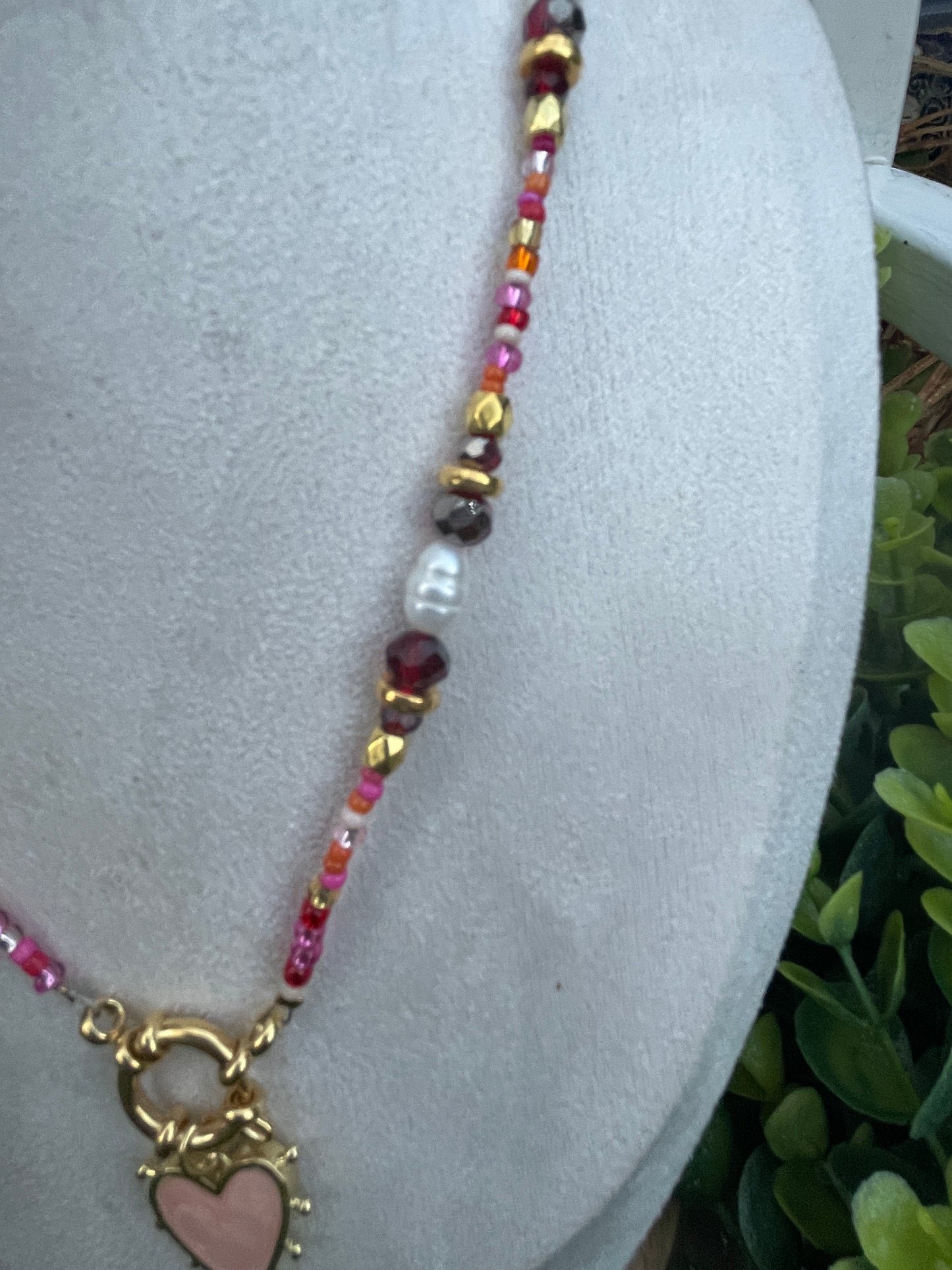 Pink and burgundy tone beaded heart necklace