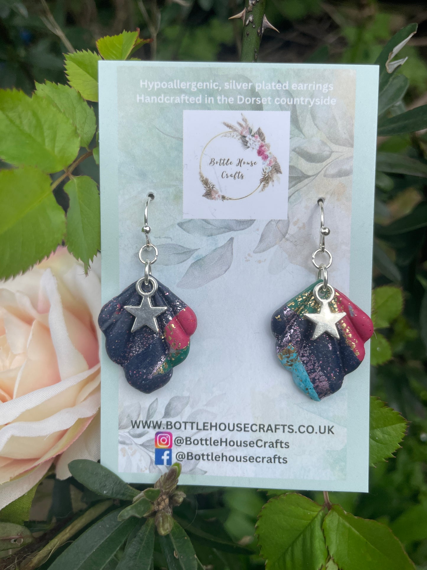 Multi shimmer star drop earrings