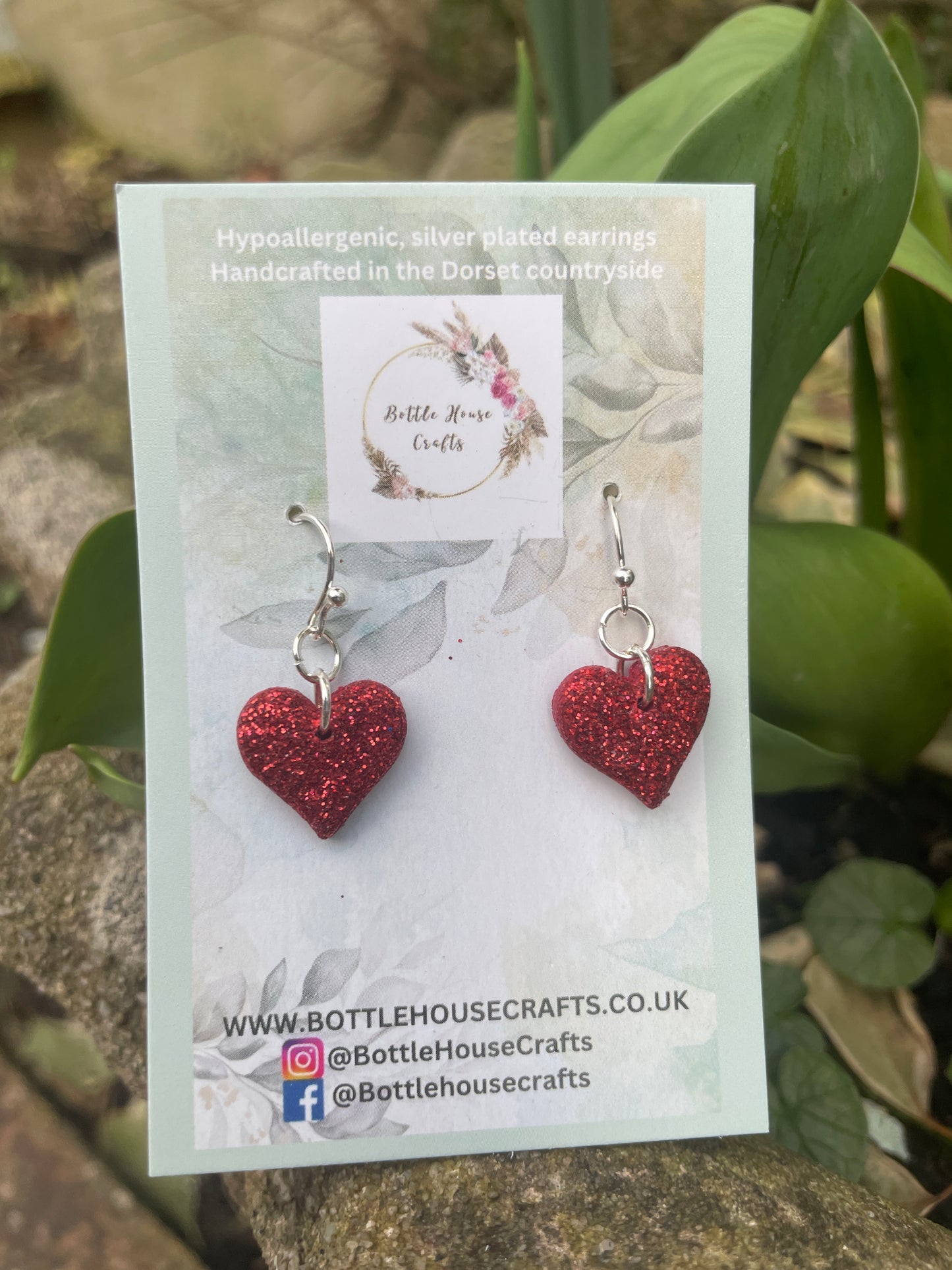 Red heart dangle earrings