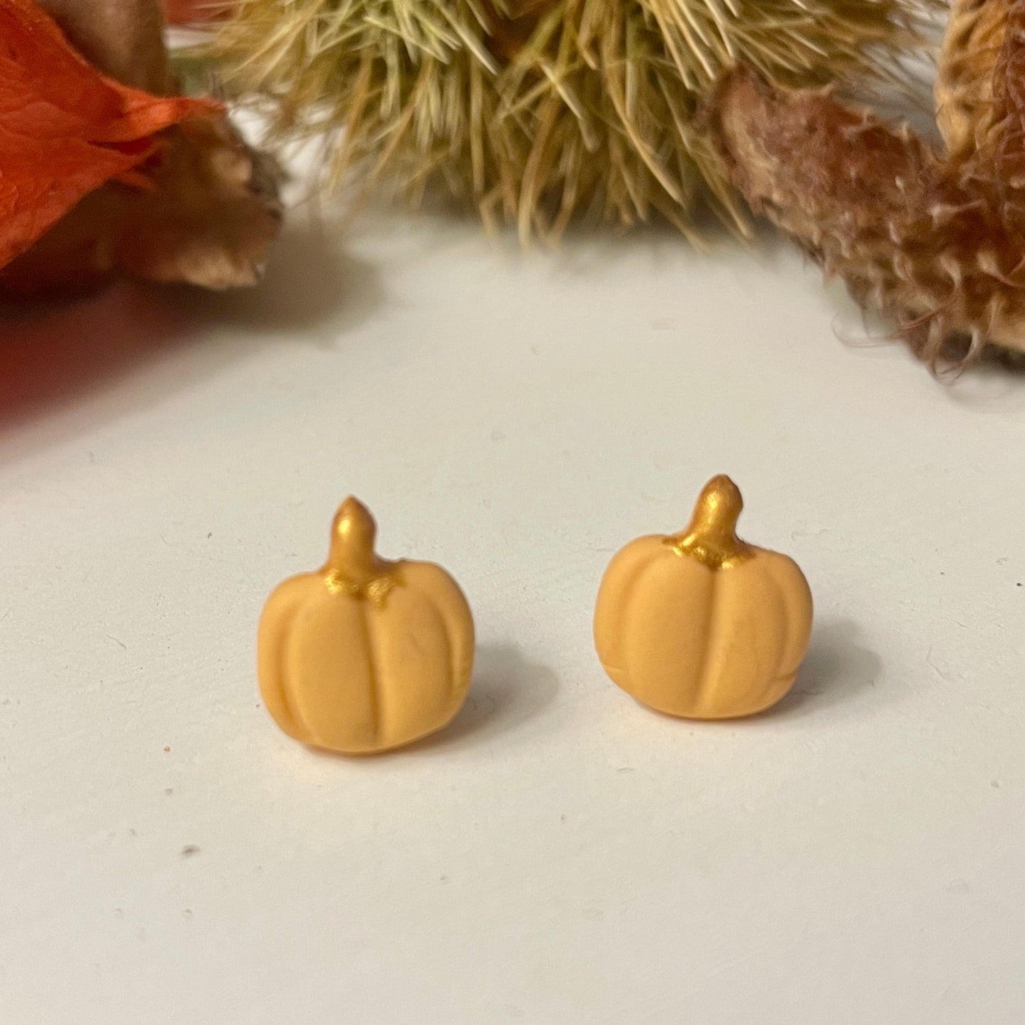Mushroom and pumpkin stud duo