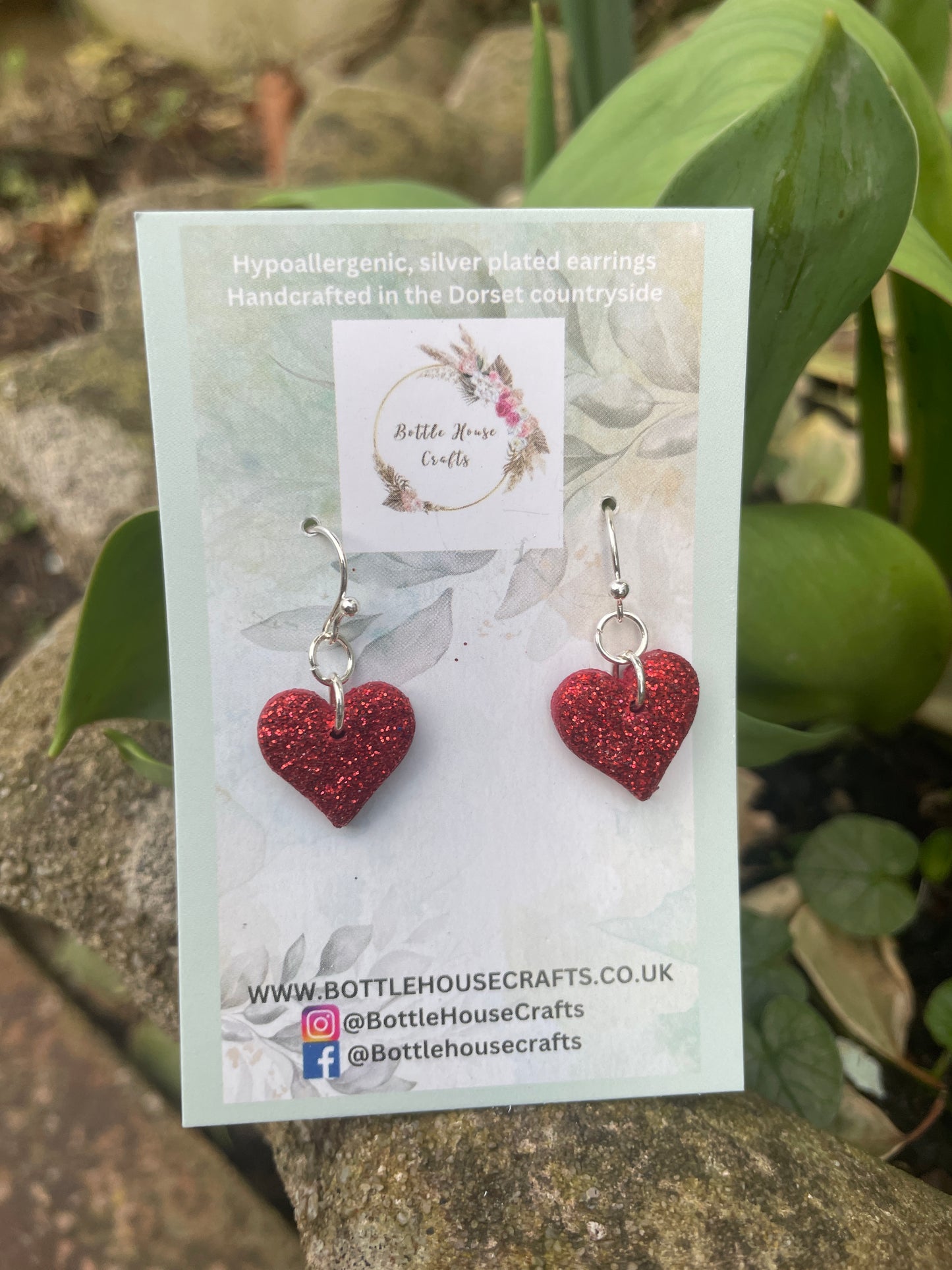 Red heart dangle earrings