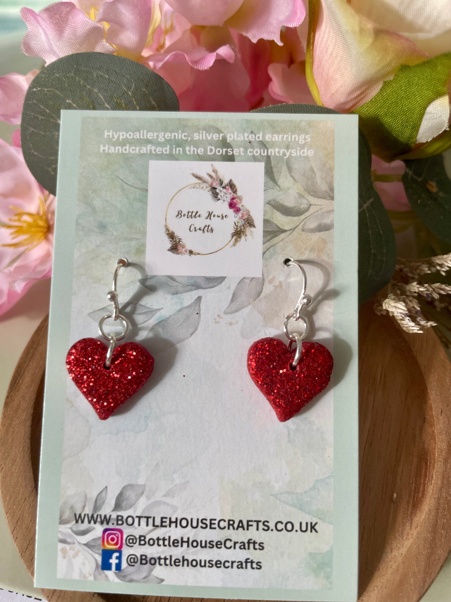 Red heart dangle earrings