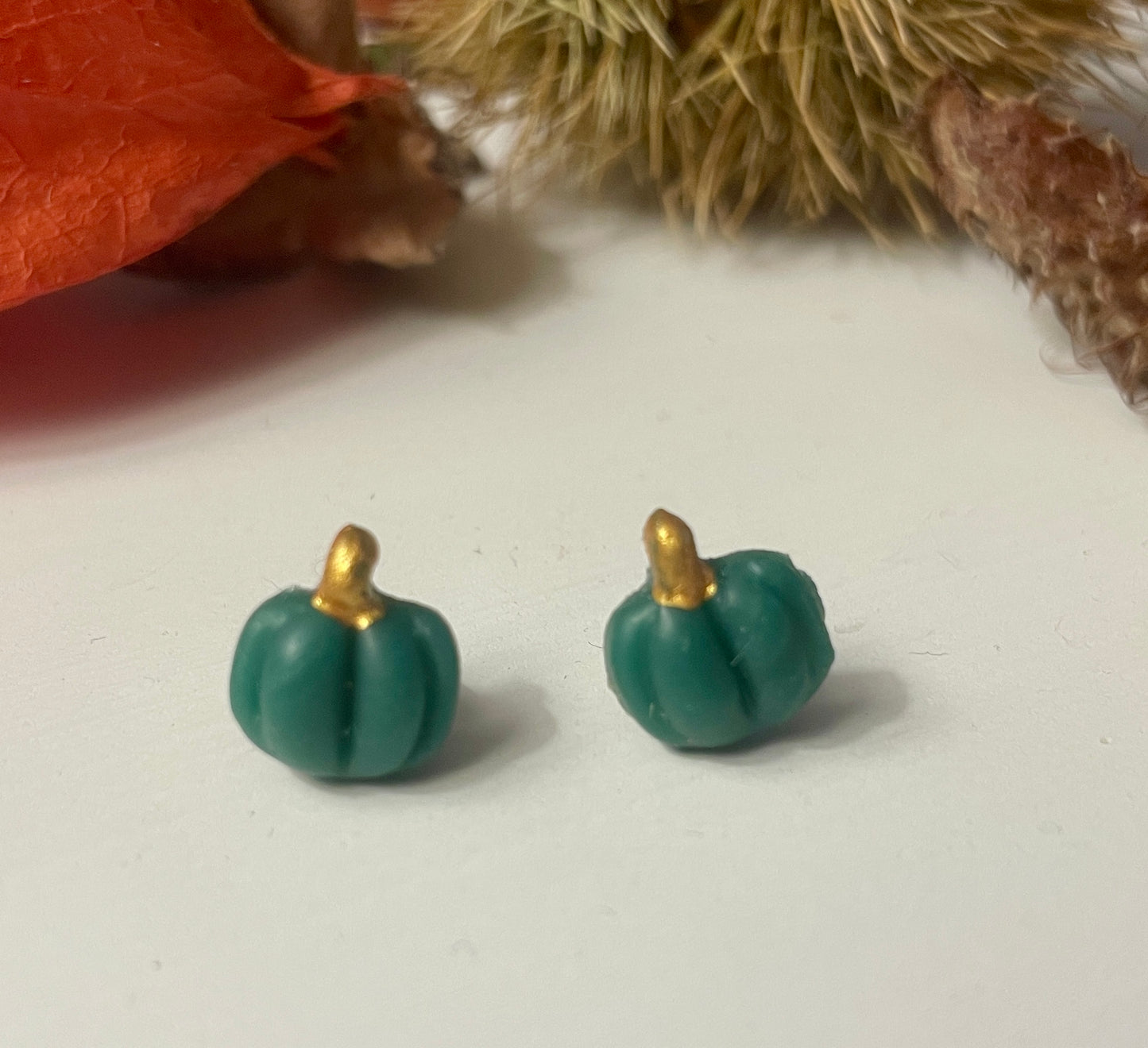 Green pumpkin studs