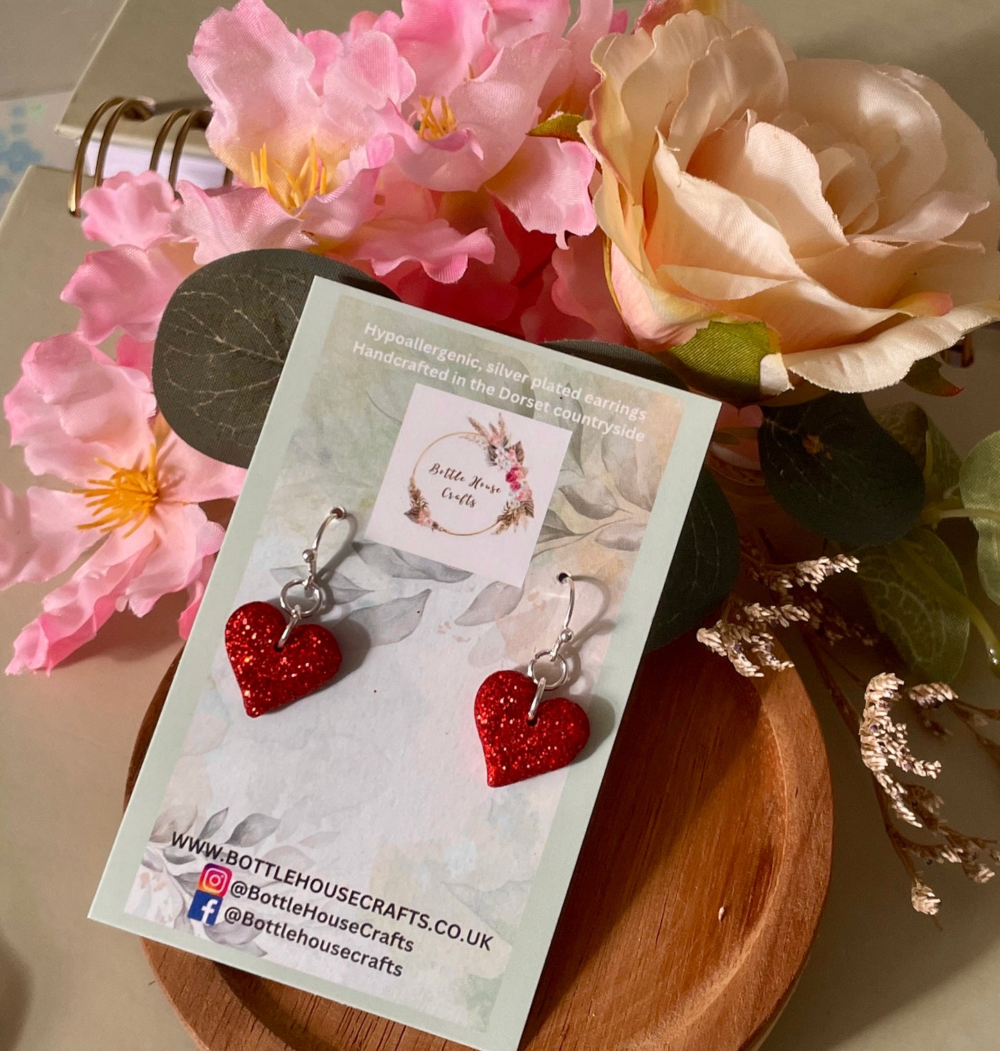 Red heart dangle earrings
