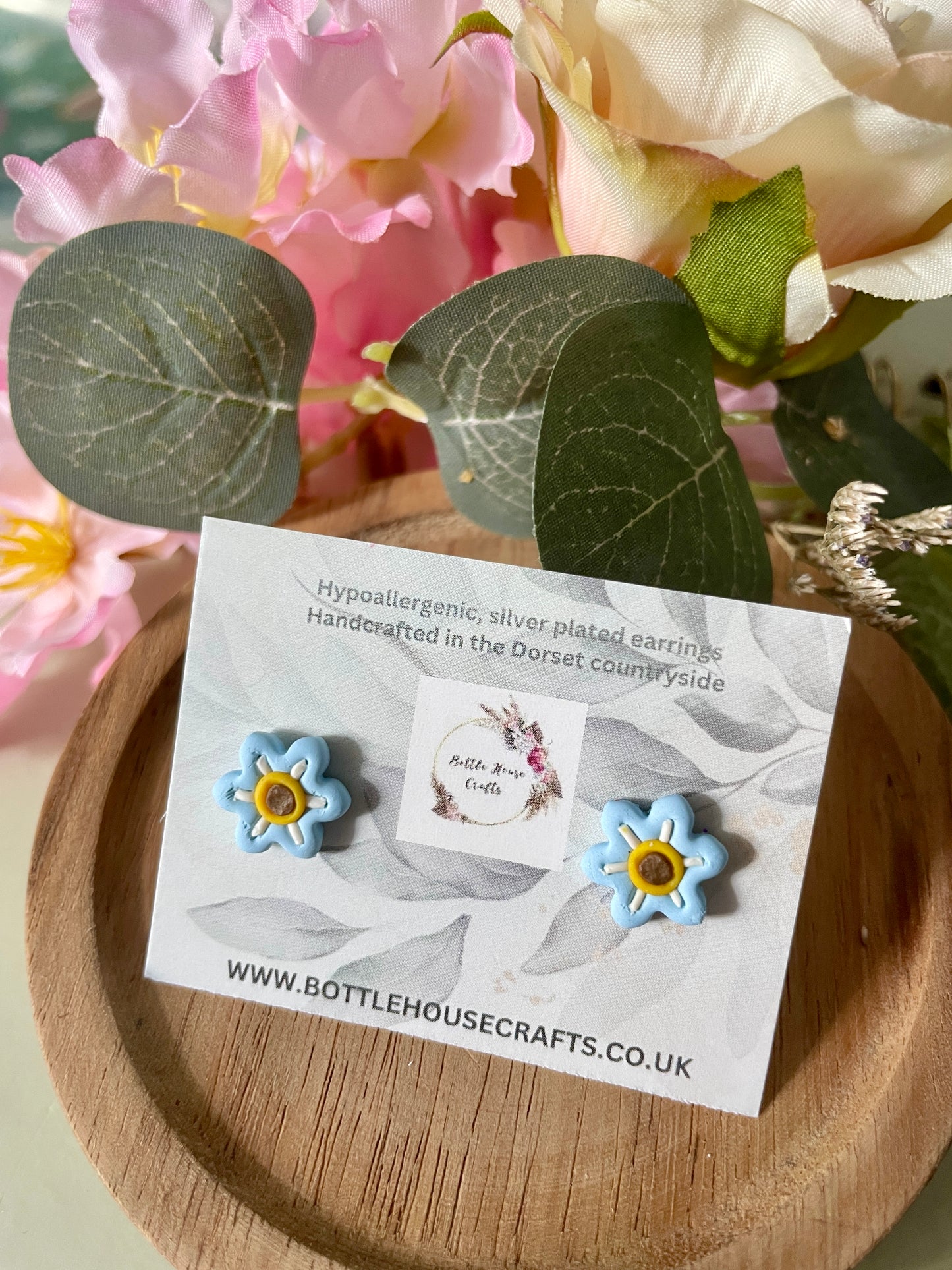 Mini floral studs - baby blue
