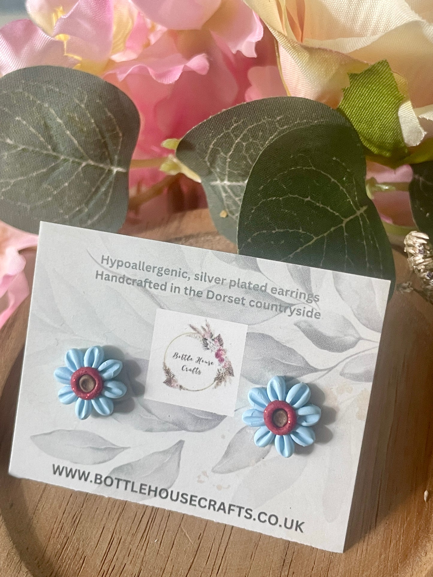 Mini floral studs - baby blue
