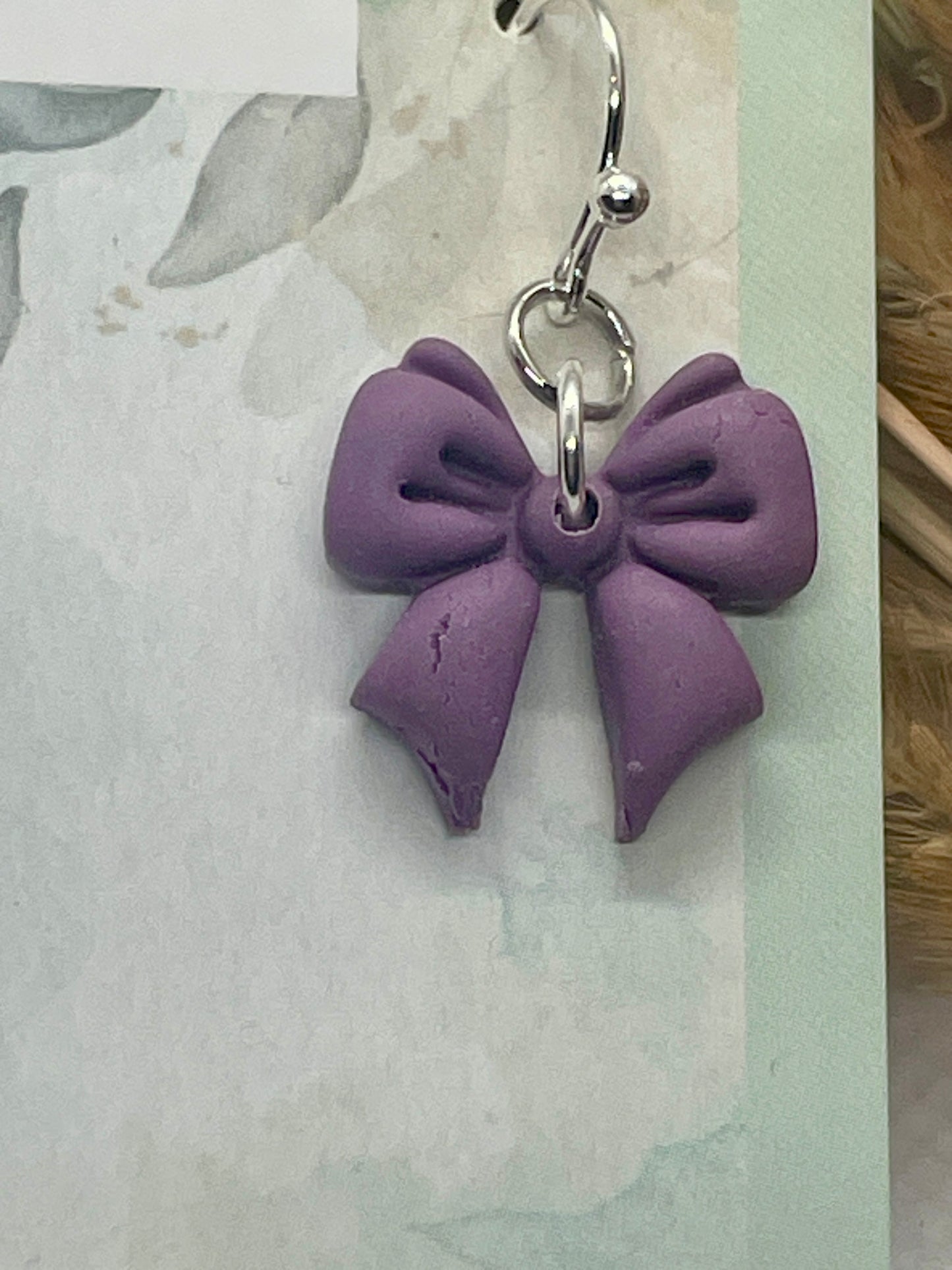 Midi purple winter bow earrings