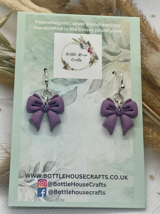 Midi purple winter bow earrings