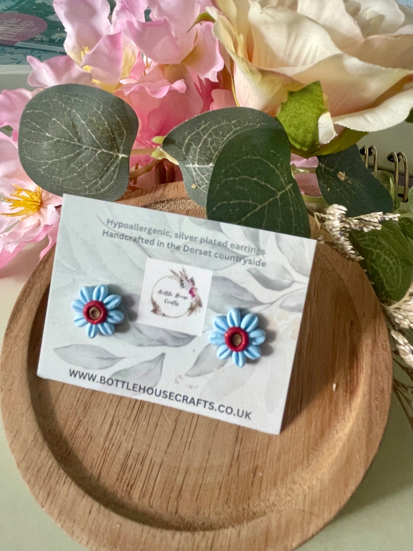 Mini floral studs - baby blue