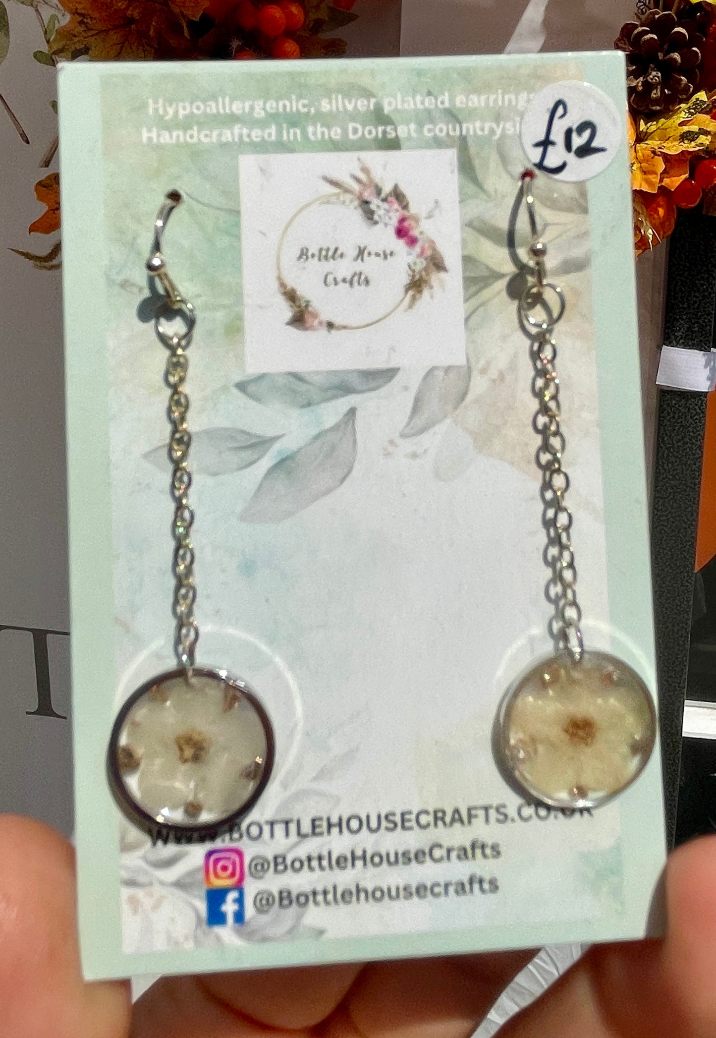 Long dangle cream floral earrings