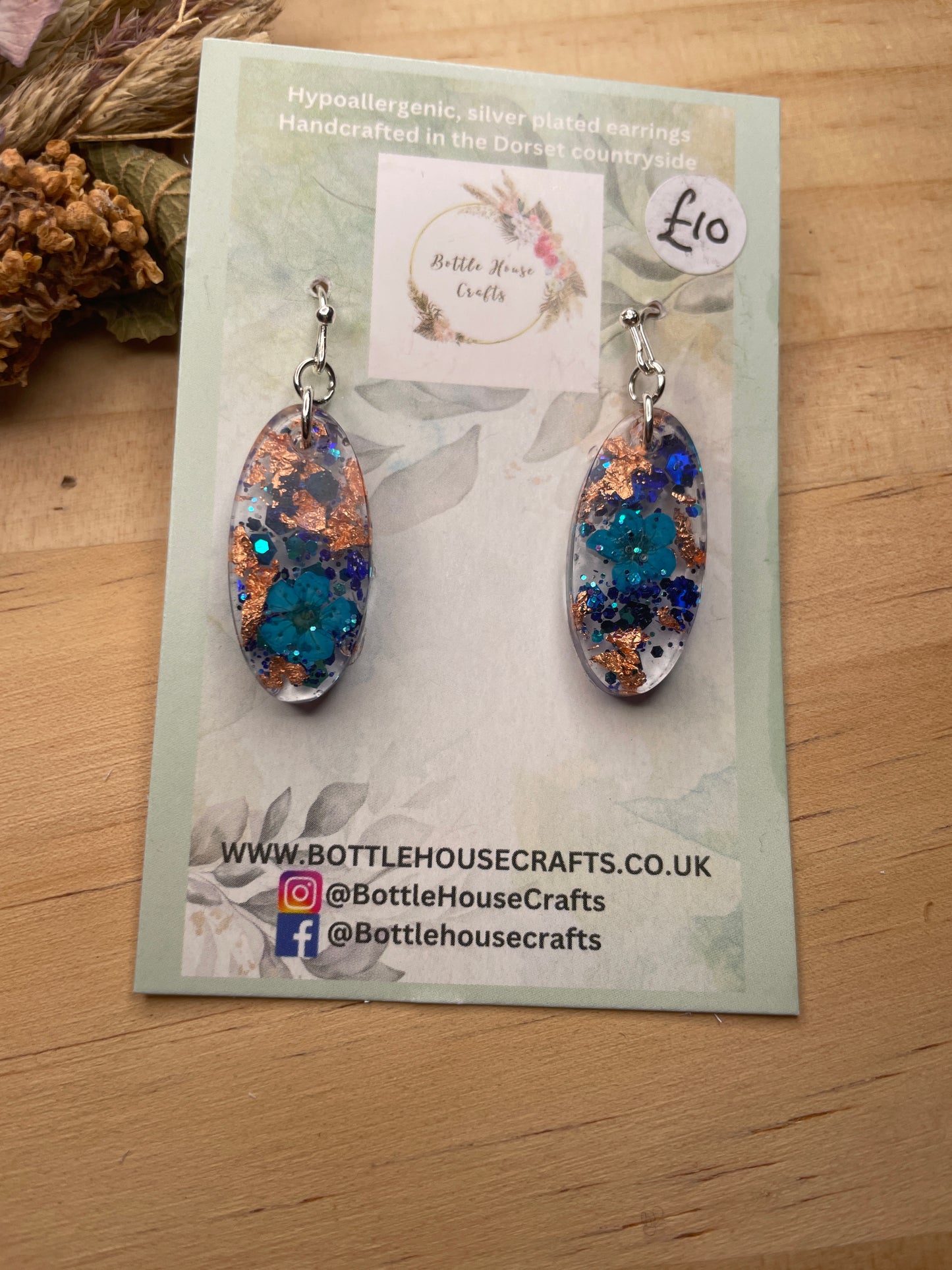 Blue and rose gold resin earrings