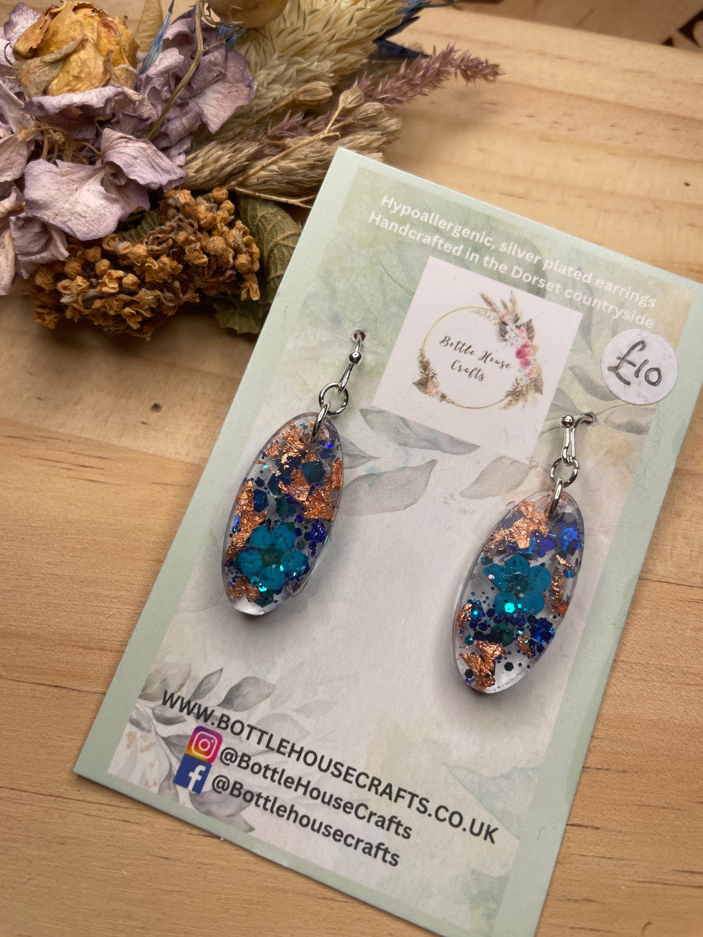 Blue and rose gold resin earrings