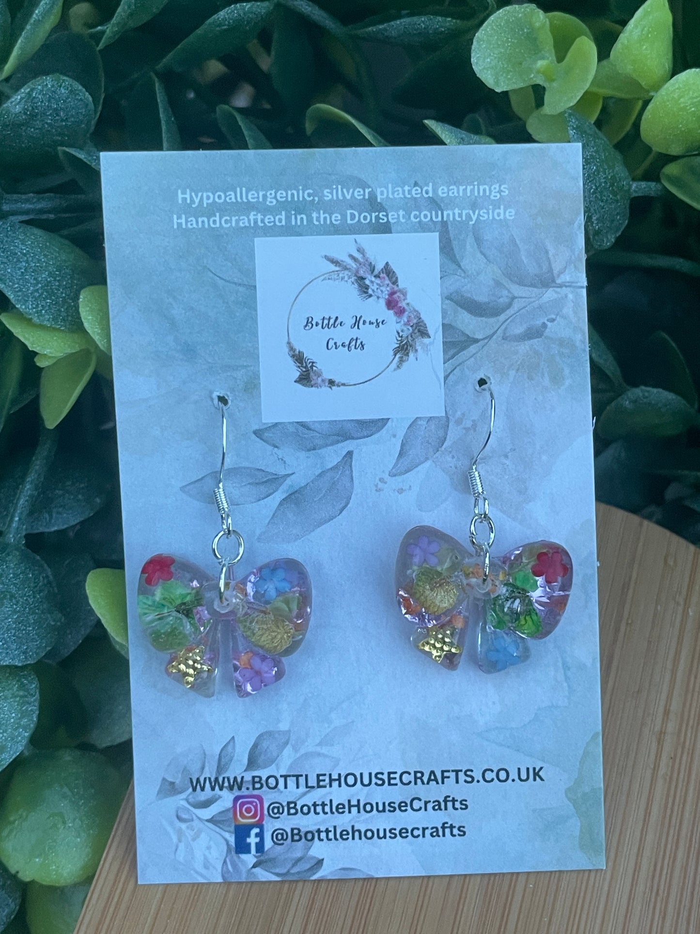 Multi coloured small bow earrings