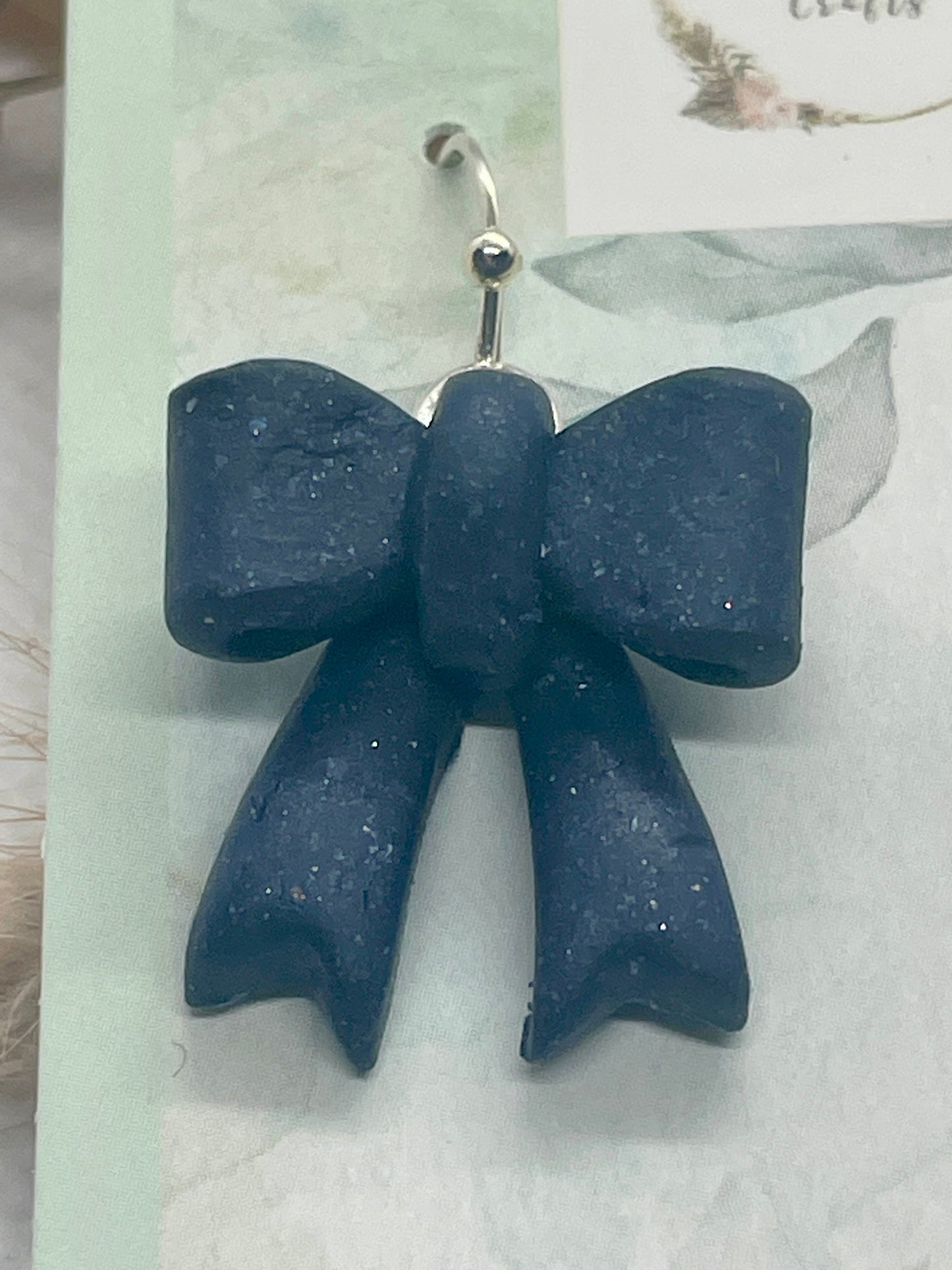 Navy larger winter bow earrings