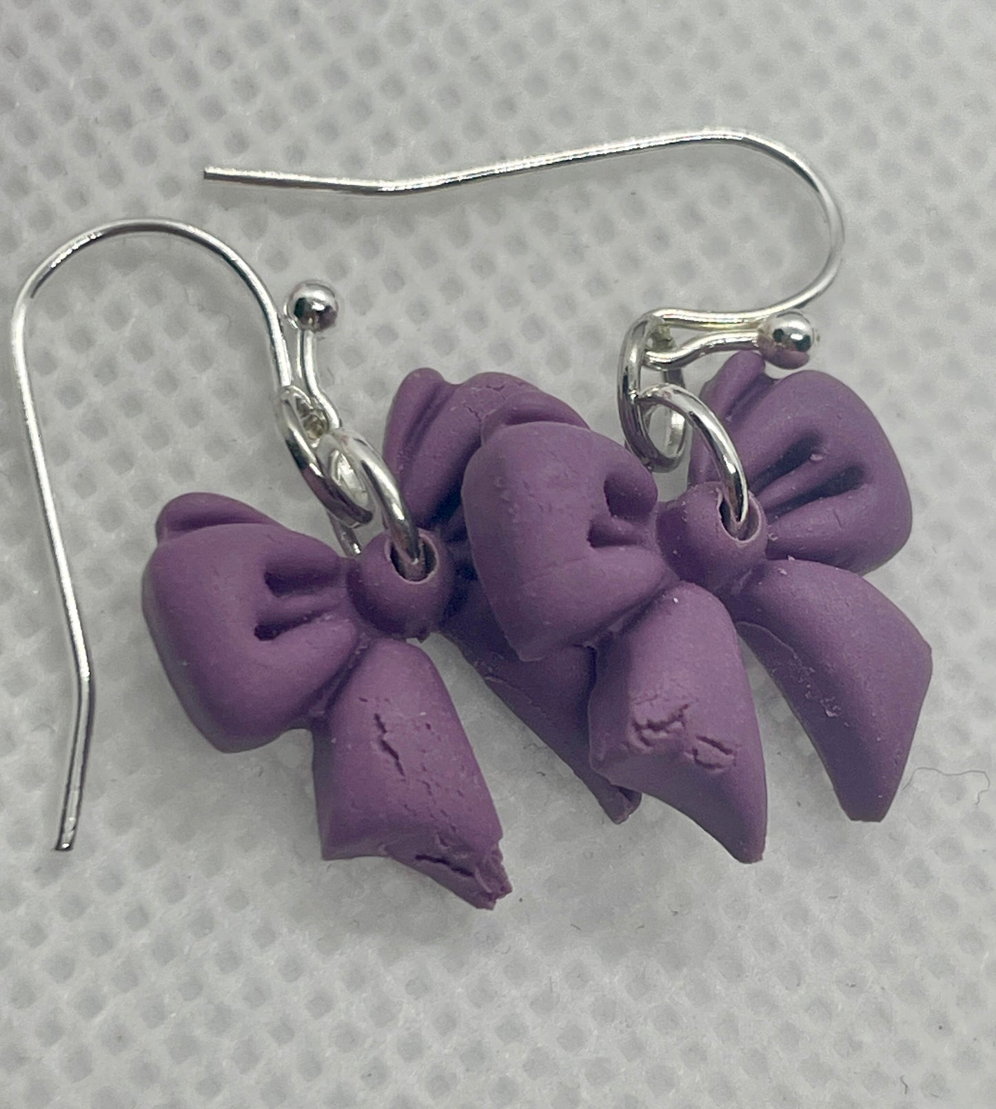 Midi purple winter bow earrings