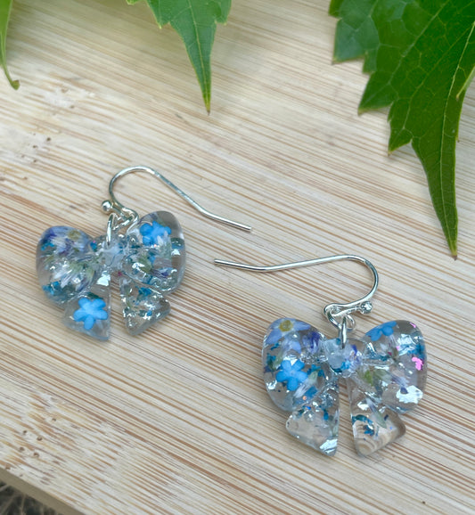Blue burst bow earrings