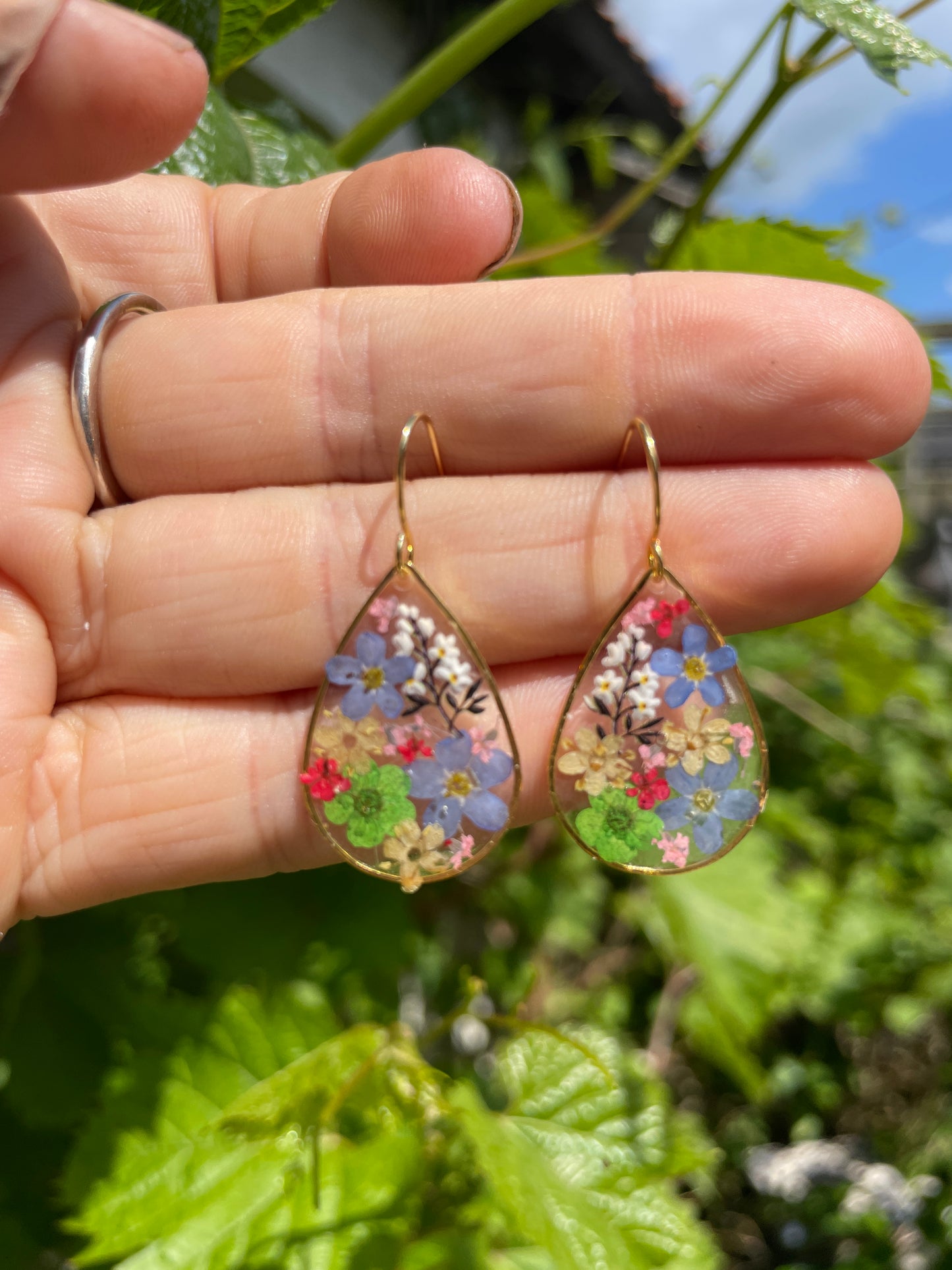 Green accent multi floral tear drop earrings