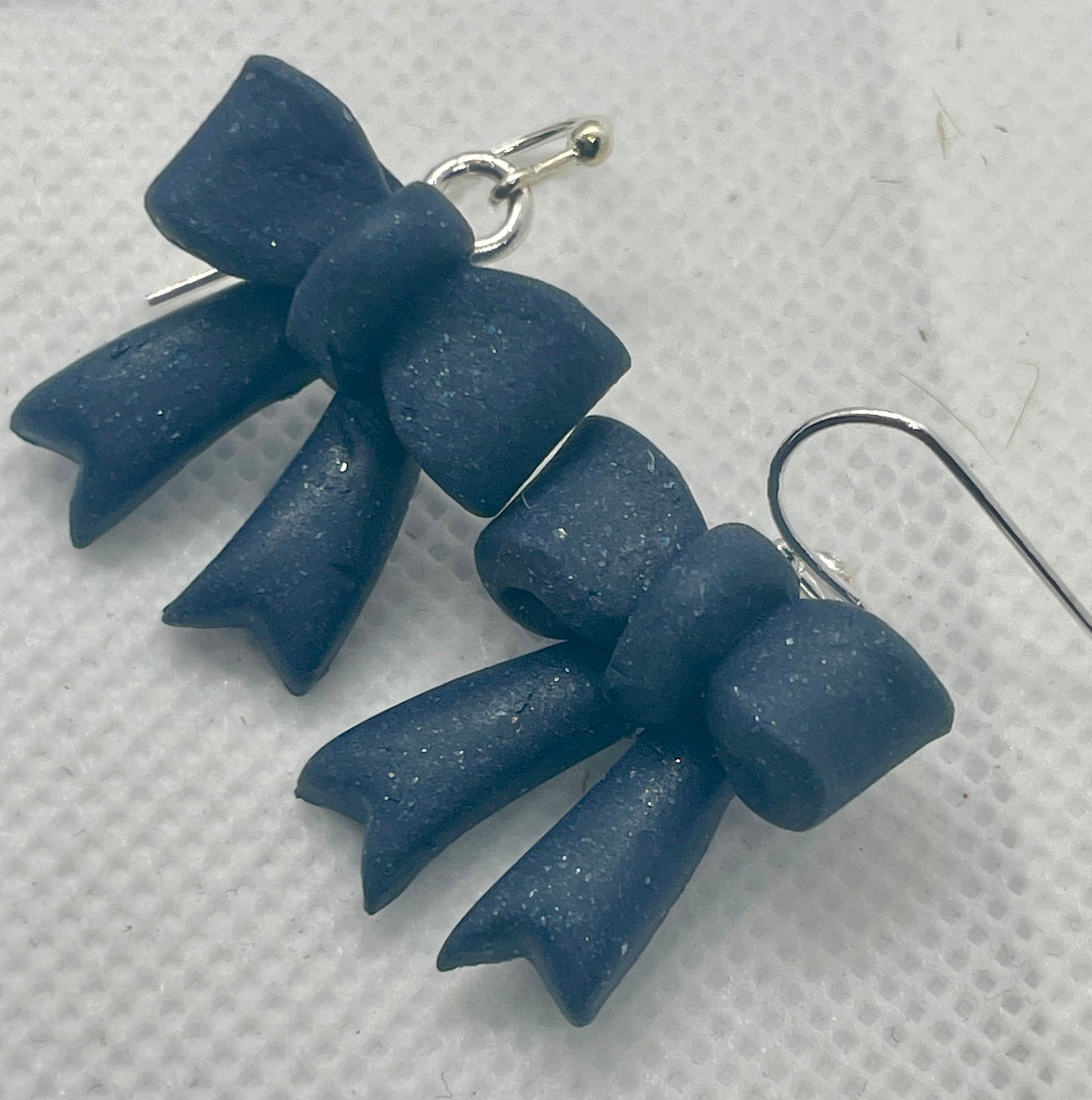 Navy larger winter bow earrings