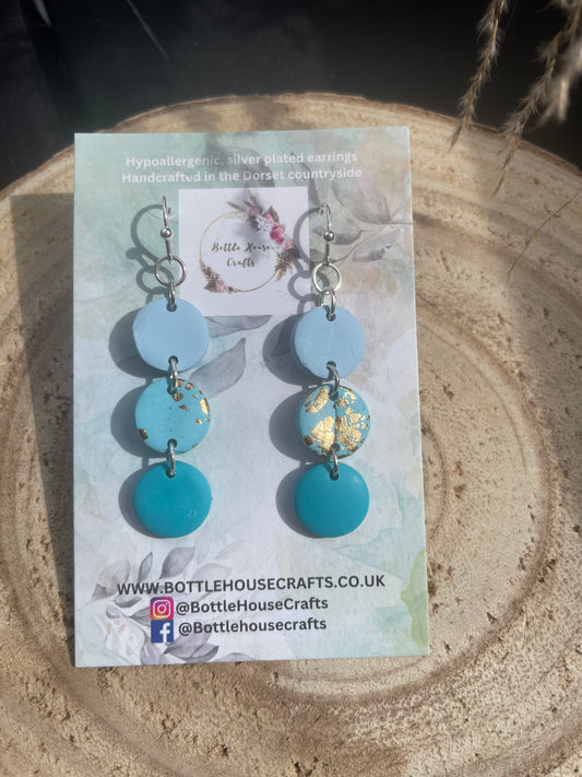 Triple drop blue button earrings